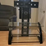 Glass Metal Tv Stand With Mount Bracket, 3 Shelves, Black Clear, Cable Manageme. Fixed Price $55.00.