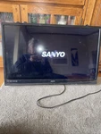 Sanyo Tv Model FW32D06F Color Black 32" With Remote No Stand Working. Fixed Price $50.00.