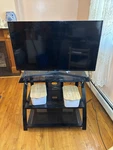 Samsung 48 Inch Smart Tv Glass Stand With Matching Coffee Table. Fixed Price $150.00.