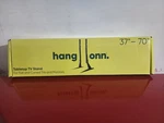 Hang Onn. Metal Tabletop Stand For 37" 70" Tvs, Holds Up 110 Lbs, Black. Fixed Price $25.49.