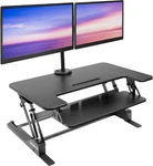 Dual Monitor Standing Desk Converter, 36" Height Adjustable Riser Black. Fixed Price $416.99.