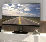 Hemudu Stand Base For 32-70" Tvs, Adjustable Height, Tempered Glass. Fixed Price $24.99.