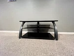 Bello Tempered Glass Tv Stand Model BTP44-6334-D978. Fixed Price $69.00.