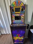 ARCADE1UP Wheel Of Fortune Video Games, 5FT Tall Cabinet. Fixed Price $400.00.