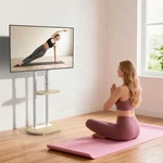 White Mobile Stand On Wheels For 40-75" Tvs, Height Adjustable With Shelf. Fixed Price $99.91.