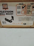 Lucasey Tv Wall Mount (new). Fixed Price $35.00.