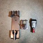 Dyson V8 V7 Wall Mount Bracket And Makita Battery Adaptor With Attachment. Fixed Price $18.00.